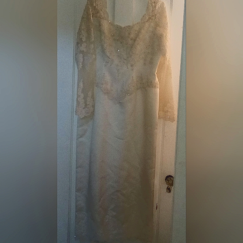 Off-White Wedding Dress with an Off-White Train.